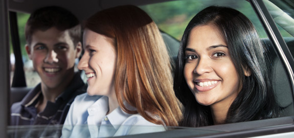 passengers riding in car back seat