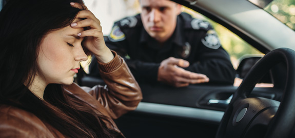 Woman in car pulled over