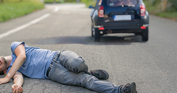 Car driving away from accident